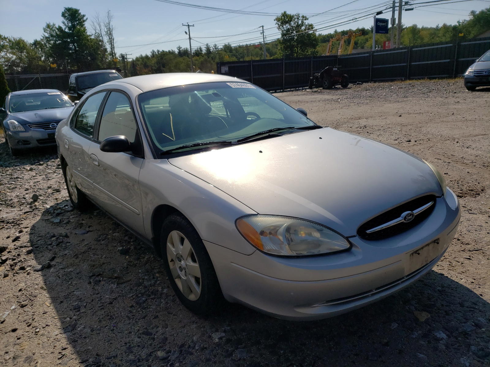 FORD TAURUS LX 2003 with VIN 1FAFP52283G153681 - Photo from auction
