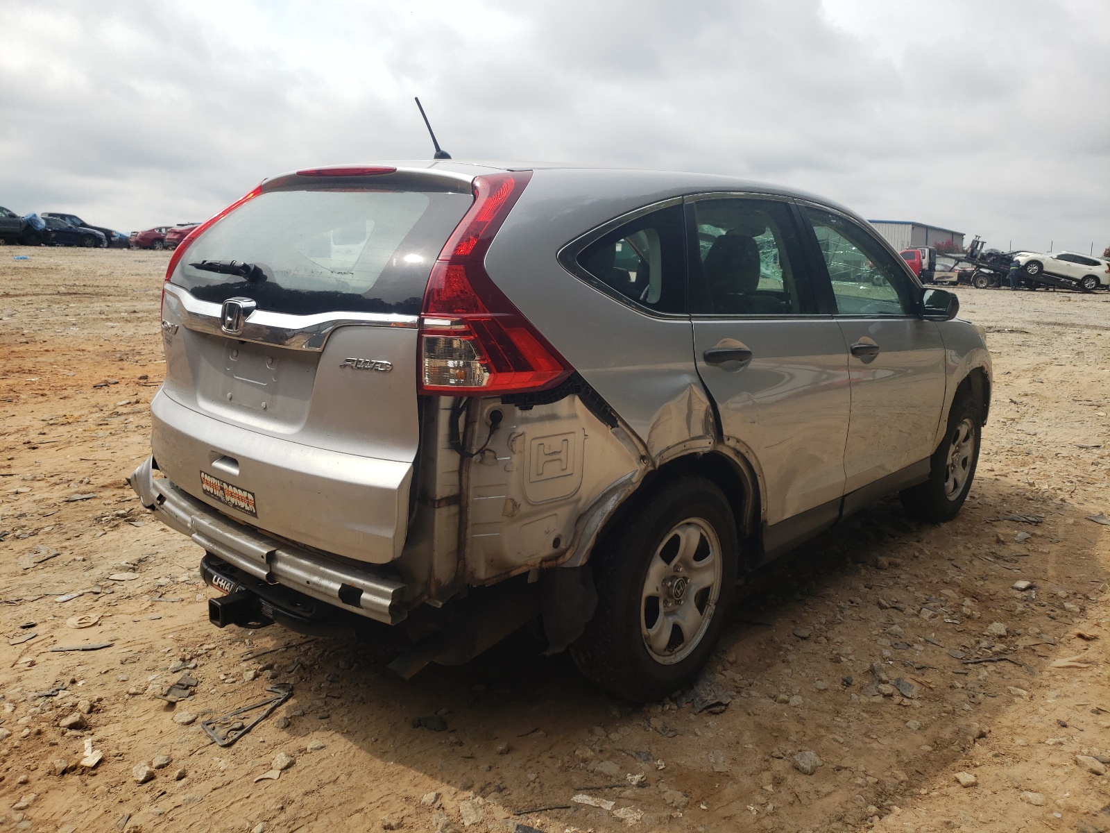 Photo 4 from auction – 2016 HONDA CR-V LX with VIN 5J6RM4H31GL129238
