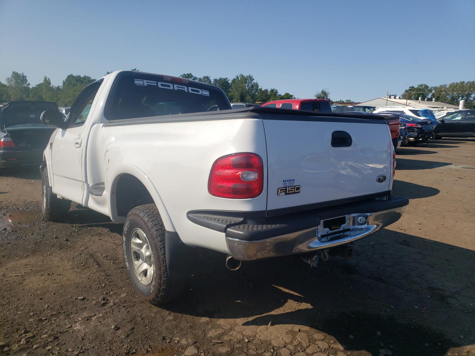 Photo 3 from auction – 1999 FORD F150 with VIN 2FTRF08W1XCA29508
