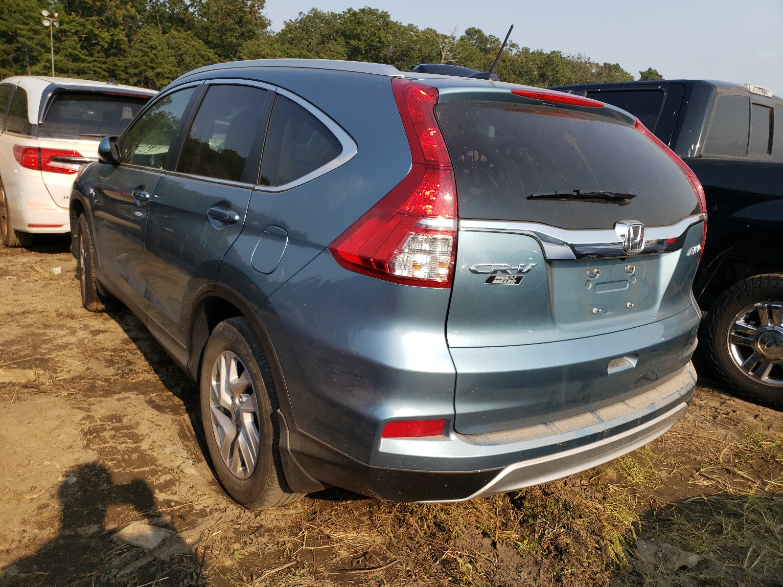 Photo 3 from auction – 2016 HONDA CR-V EXL with VIN 2HKRM4H79GH706773