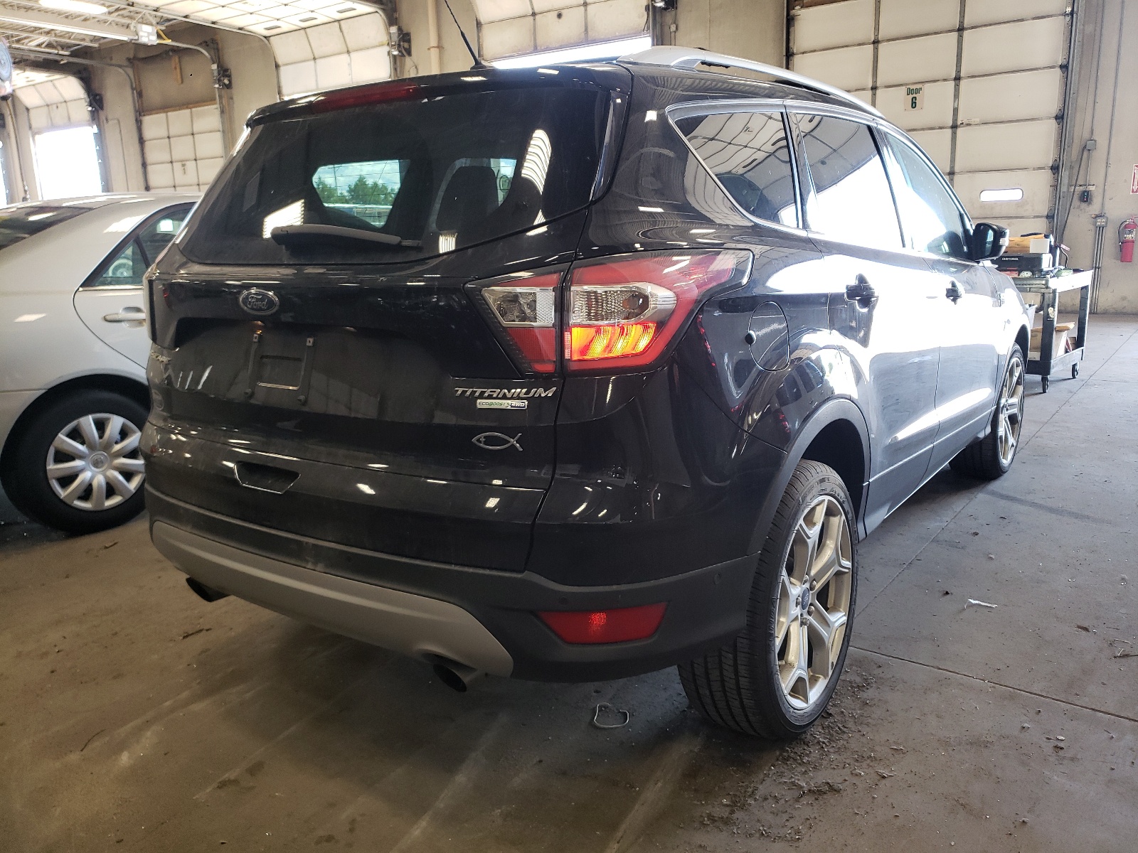 Photo 4 from auction – 2017 FORD ESCAPE TIT with VIN 1FMCU9J91HUA97681