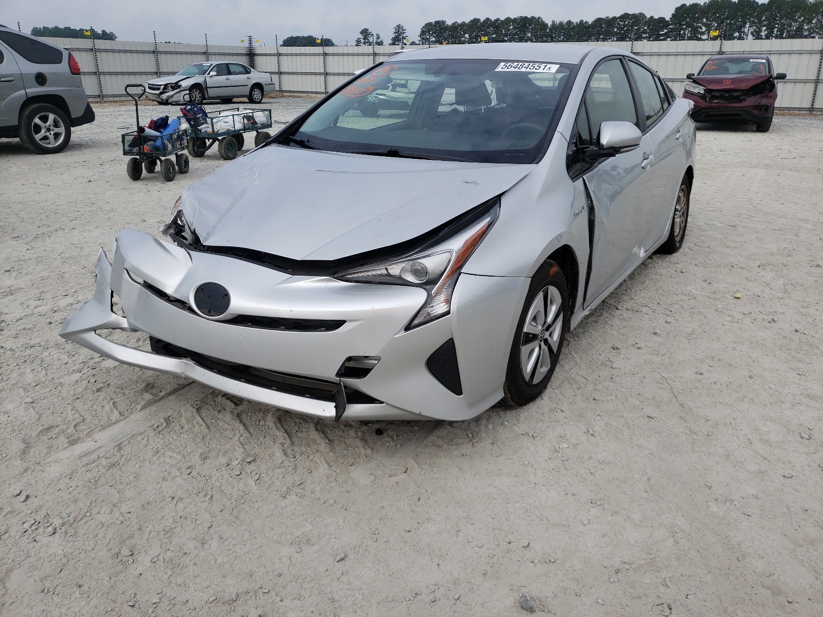 Photo 2 from auction – 2016 TOYOTA PRIUS with VIN JTDKARFU9G3007591