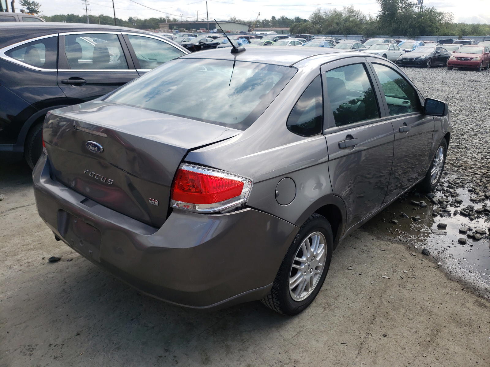 Photo 4 from auction – 2011 FORD FOCUS SE with VIN 1FAHP3FN8BW139642