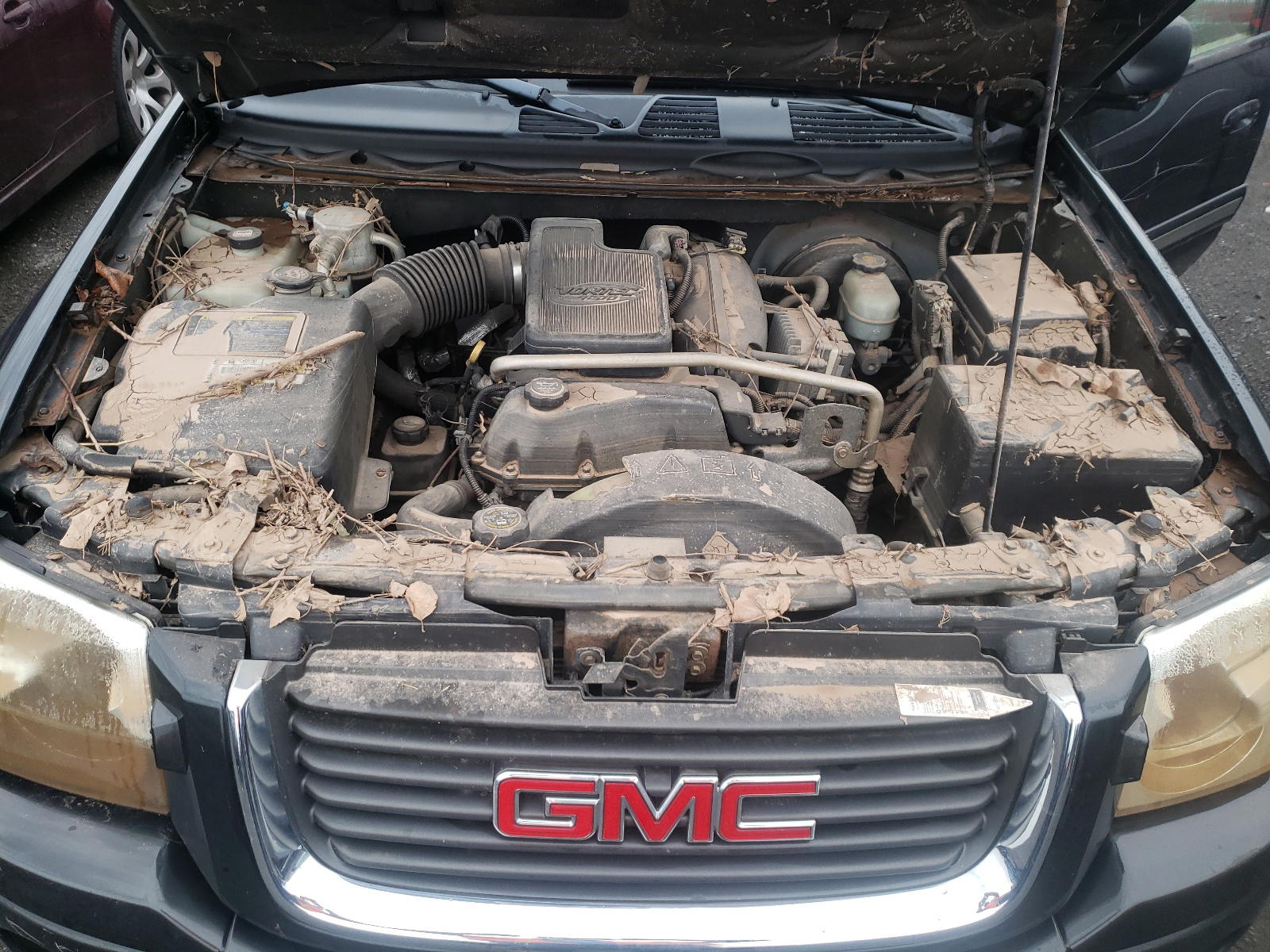 Photo 7 from auction – 2003 GMC ENVOY with VIN 1GKDT13S532246633