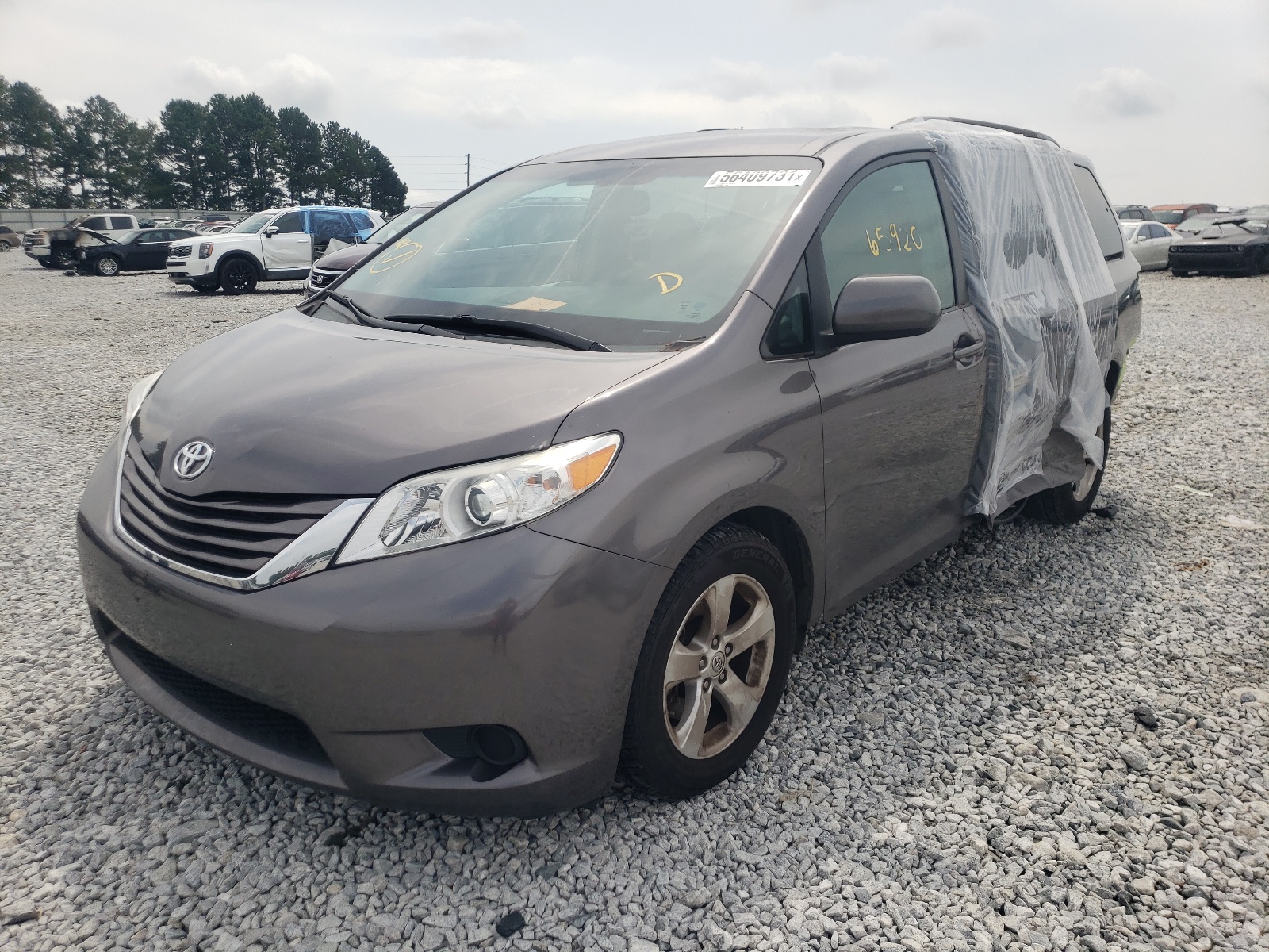 Photo 2 from auction – 2015 TOYOTA SIENNA LE with VIN 5TDKK3DC7FS645808