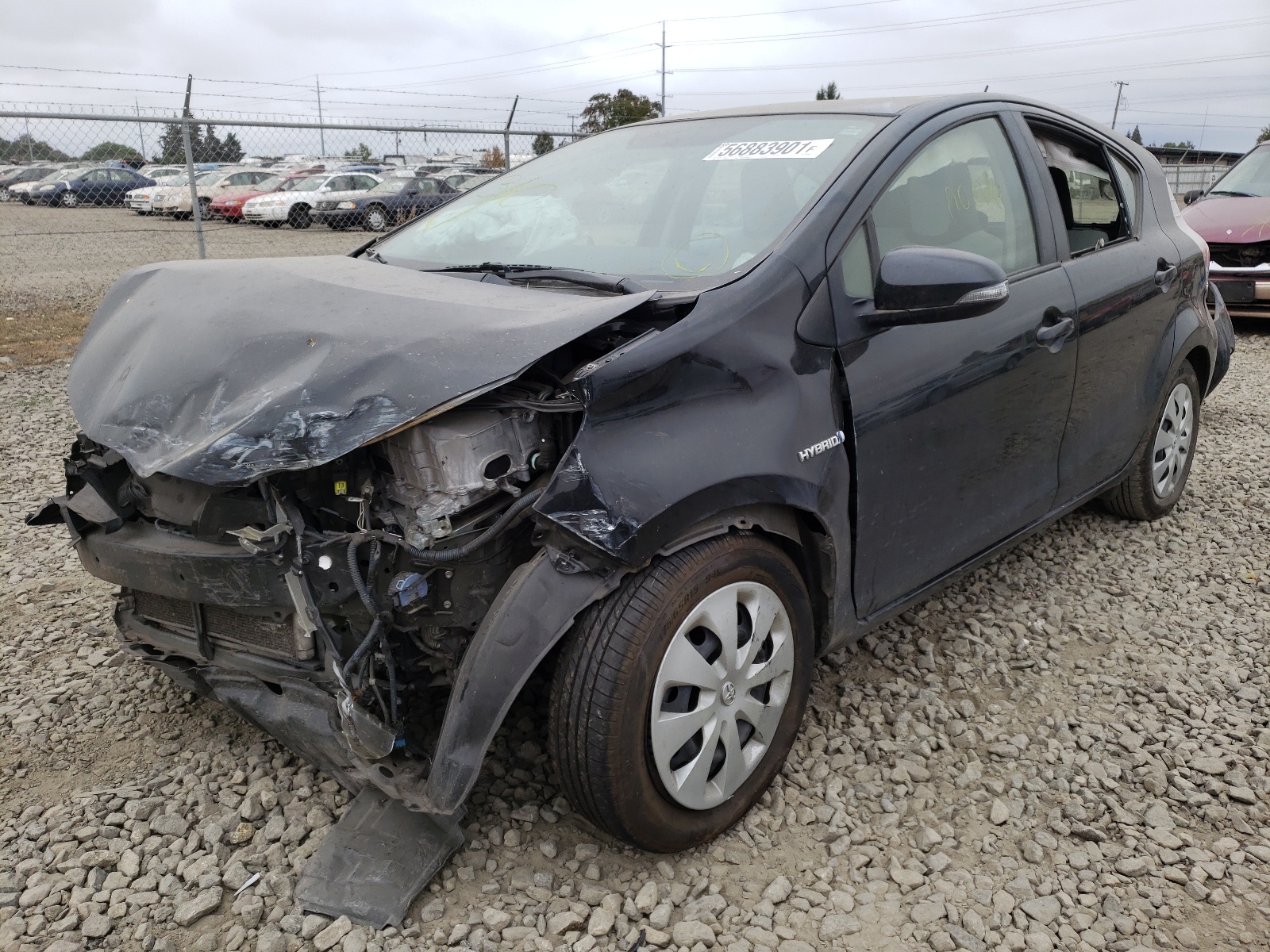 Photo 2 from auction – 2014 TOYOTA PRIUS C with VIN JTDKDTB31E1563226