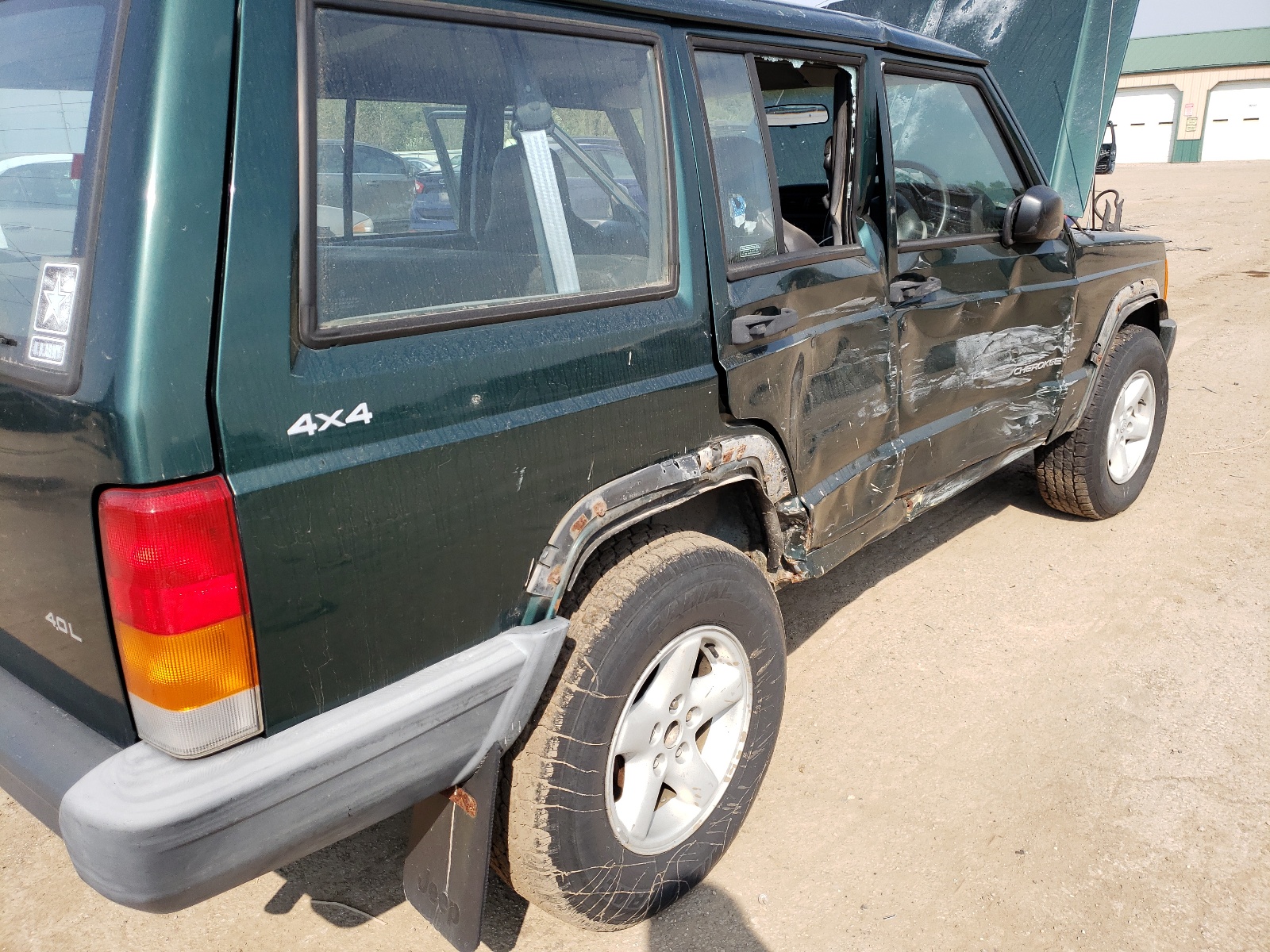 Photo 10 from auction – 1999 JEEP CHEROKEE S with VIN 1J4FN28S8XL609501