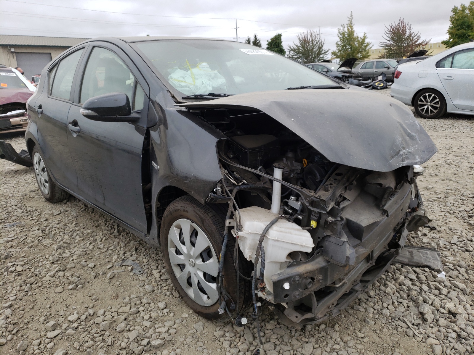 TOYOTA PRIUS C 2014 with VIN JTDKDTB31E1563226 - Photo from auction