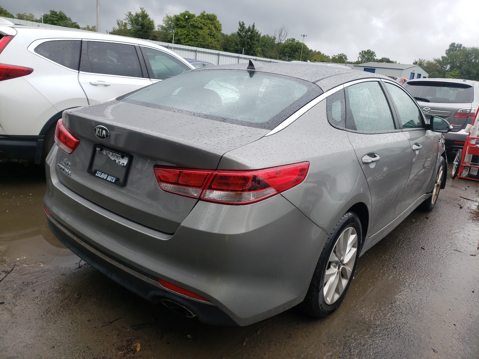 Photo 4 from auction – 2017 KIA OPTIMA LX with VIN 5XXGT4L35HG164700