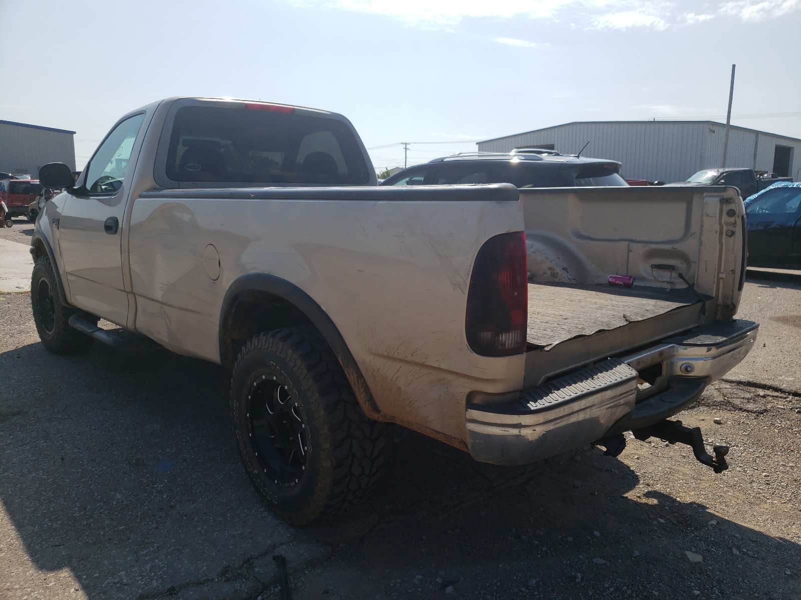 Photo 3 from auction – 1998 FORD F150 with VIN 1FTRF18L2WKA42807