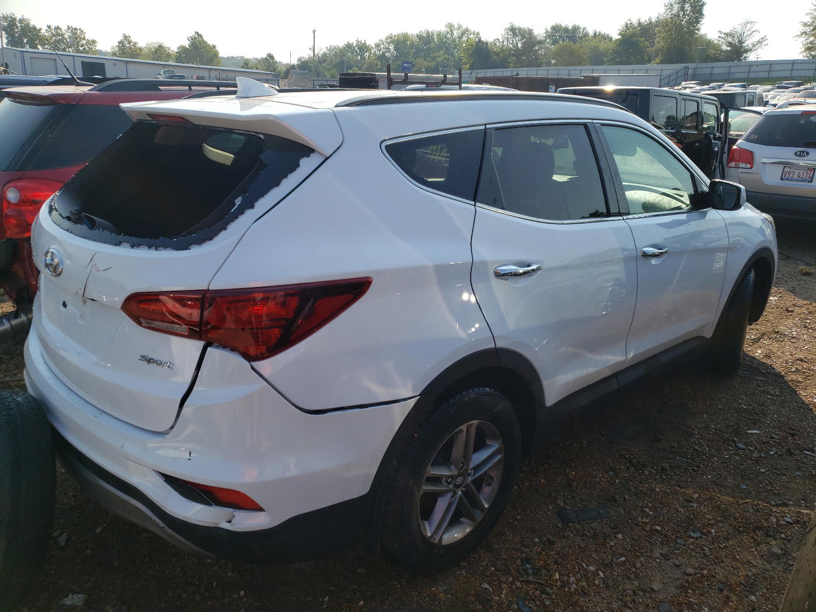 Photo 4 from auction – 2017 HYUNDAI SANTA FE S with VIN 5NMZU3LB9HH018969