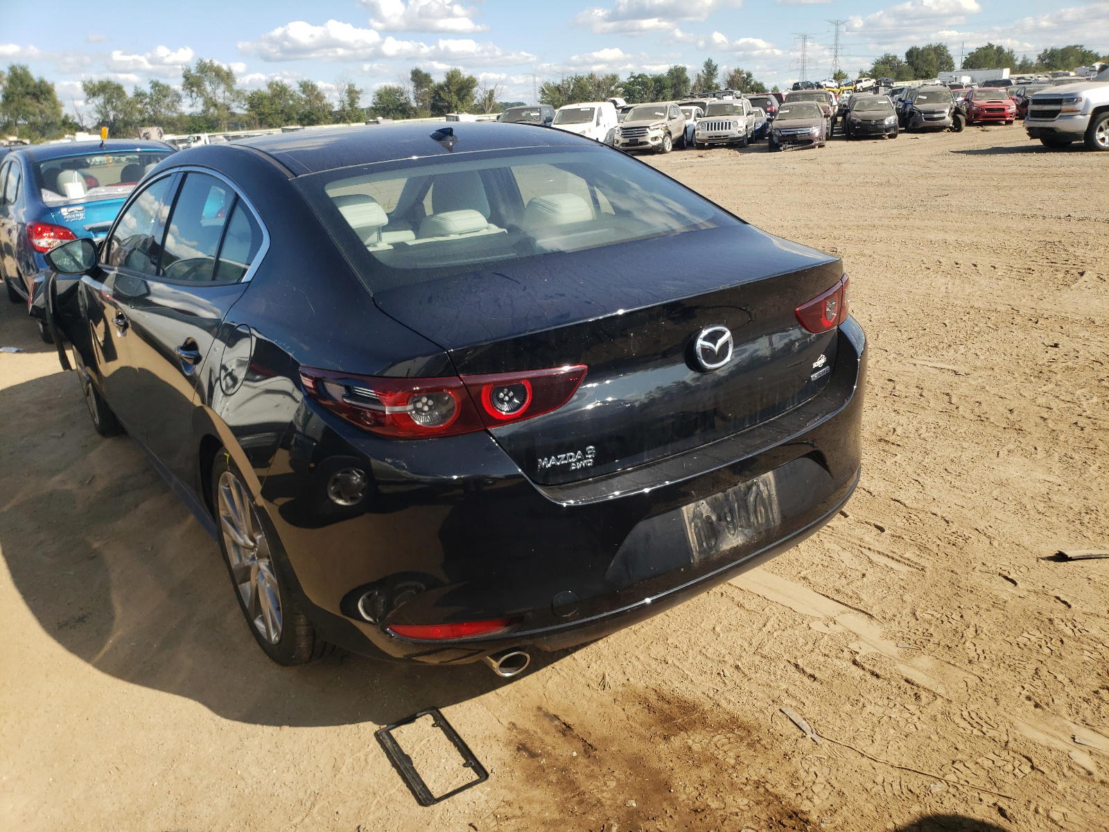 Photo 3 from auction – 2020 MAZDA 3 PREMIUM with VIN 3MZBPBEM7LM129198
