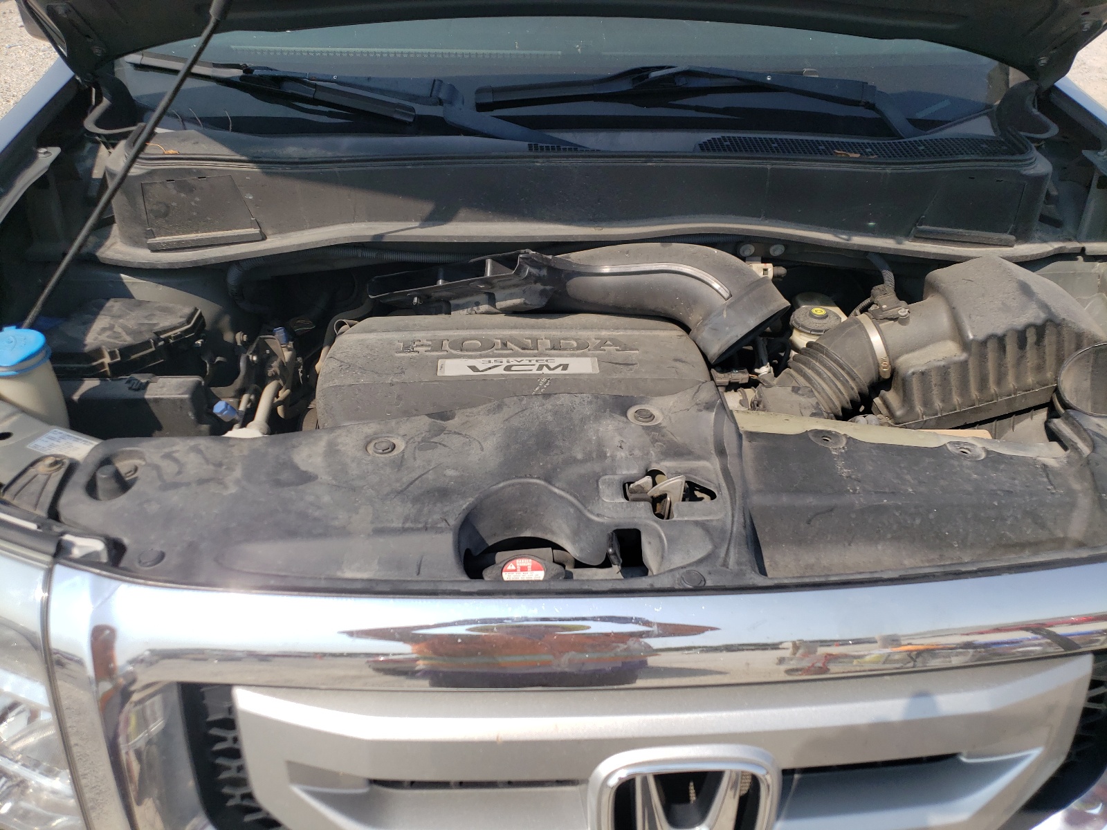 Photo 7 from auction – 2009 HONDA PILOT EXL with VIN 5FNYF386X9B016538