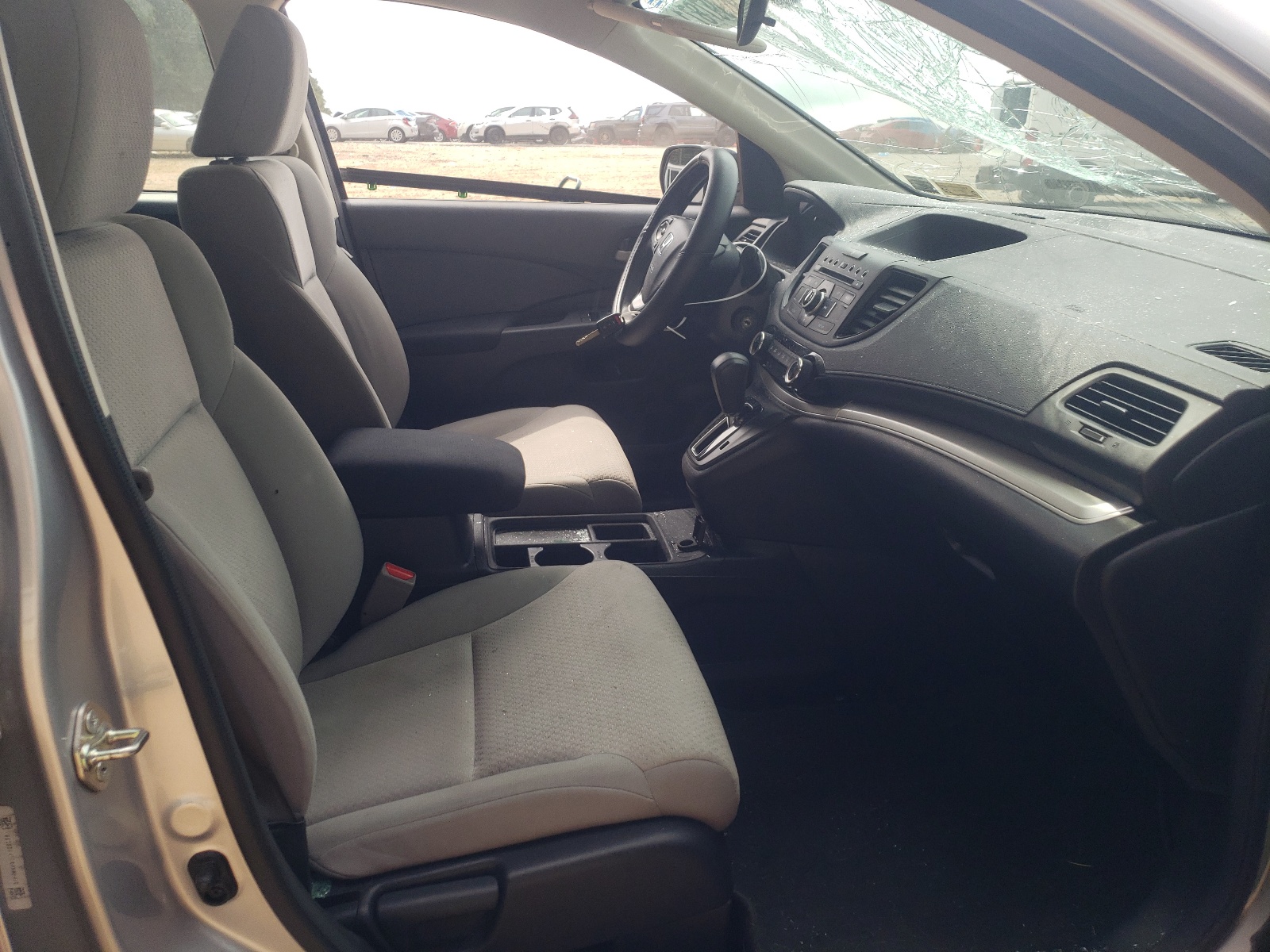 Photo 5 from auction – 2016 HONDA CR-V LX with VIN 5J6RM4H31GL129238