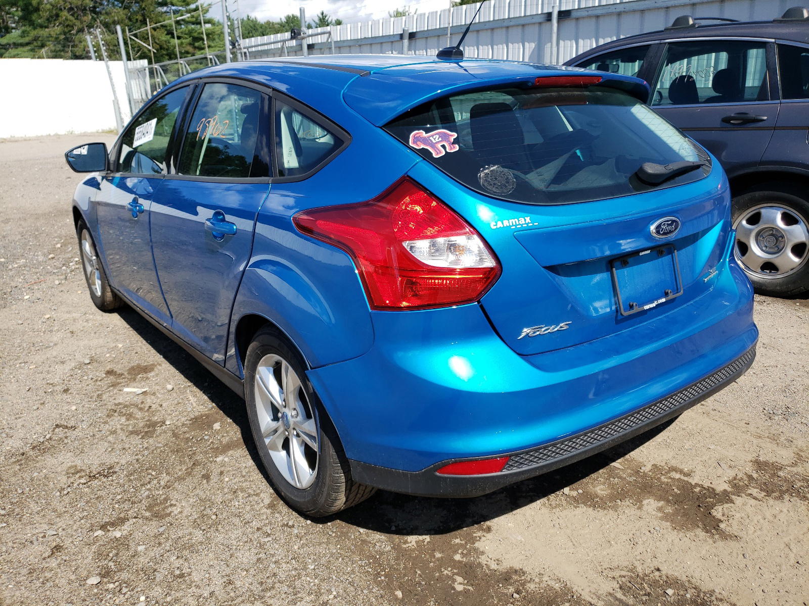 Photo 3 from auction – 2013 FORD FOCUS SE with VIN 1FADP3K23DL186091