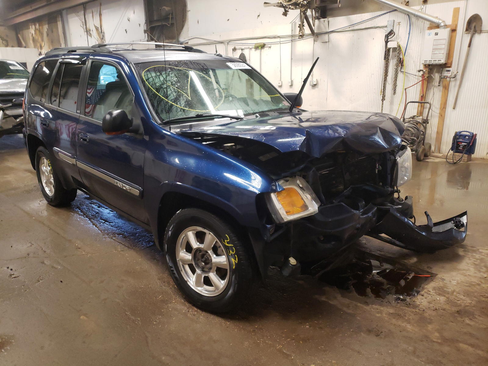 GMC ENVOY 2004 with VIN 1GKDT13S342438845 - Photo from auction