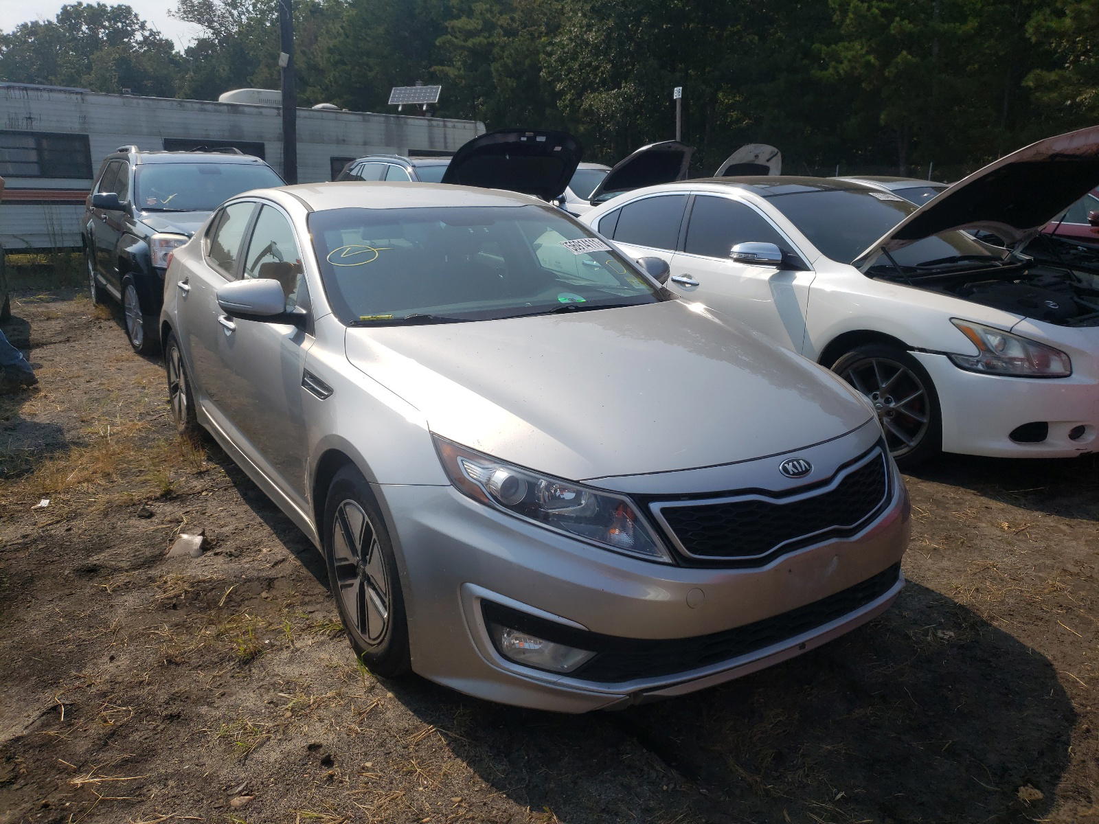 KIA OPTIMA HYB 2012 with VIN KNAGM4AD5C5031423 - Photo from auction