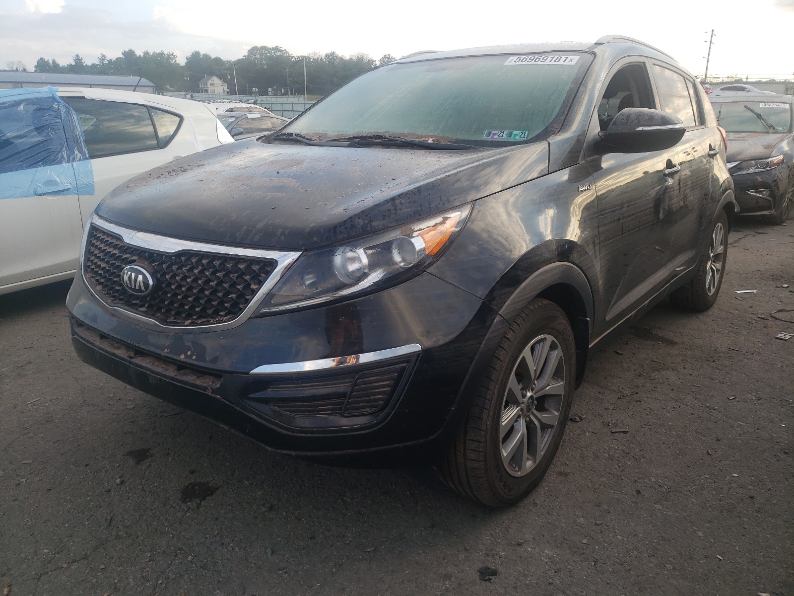 Photo 2 from auction – 2015 KIA SPORTAGE L with VIN KNDPBCAC2F7739776