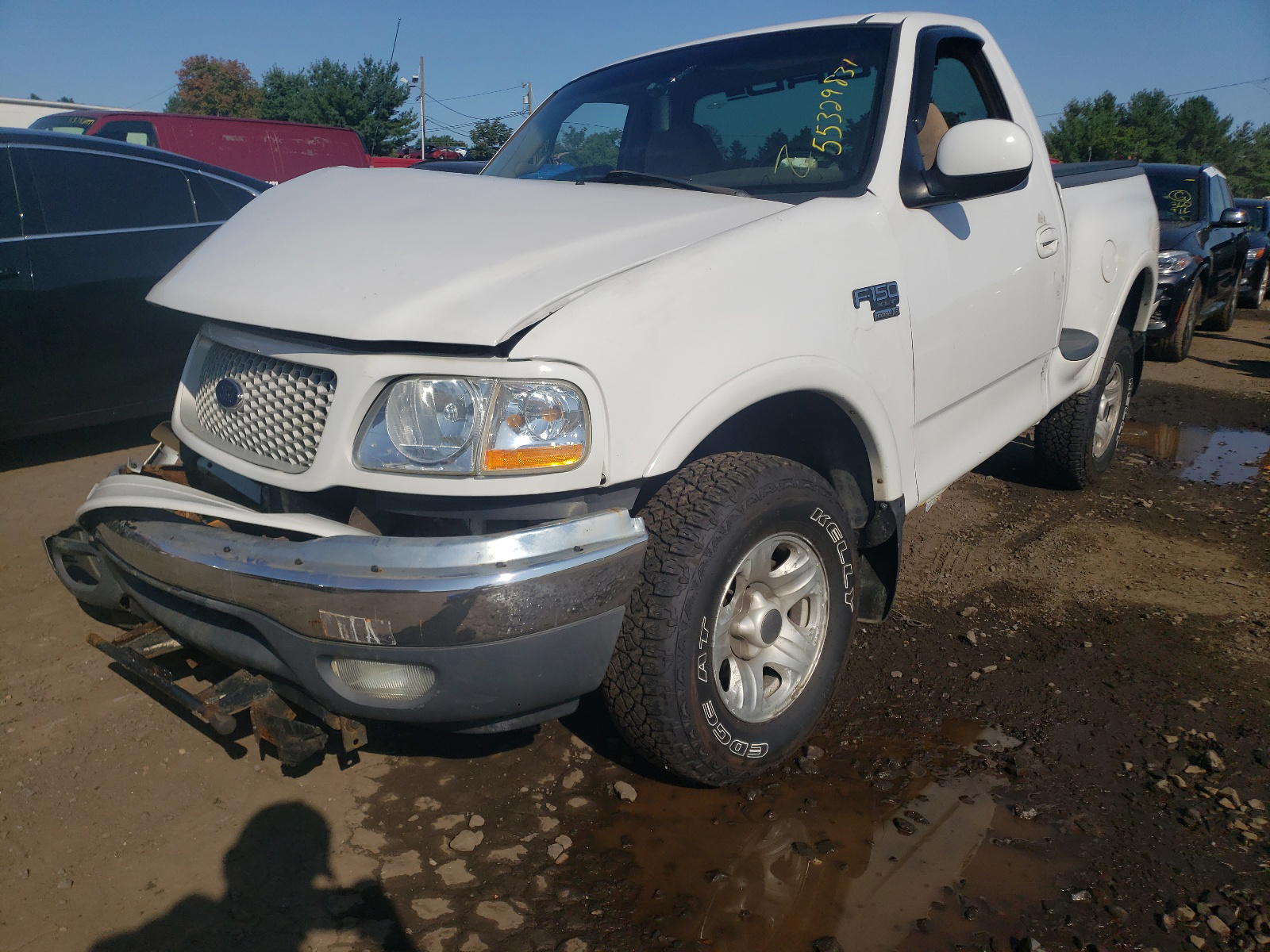 Photo 2 from auction – 1999 FORD F150 with VIN 2FTRF08W1XCA29508