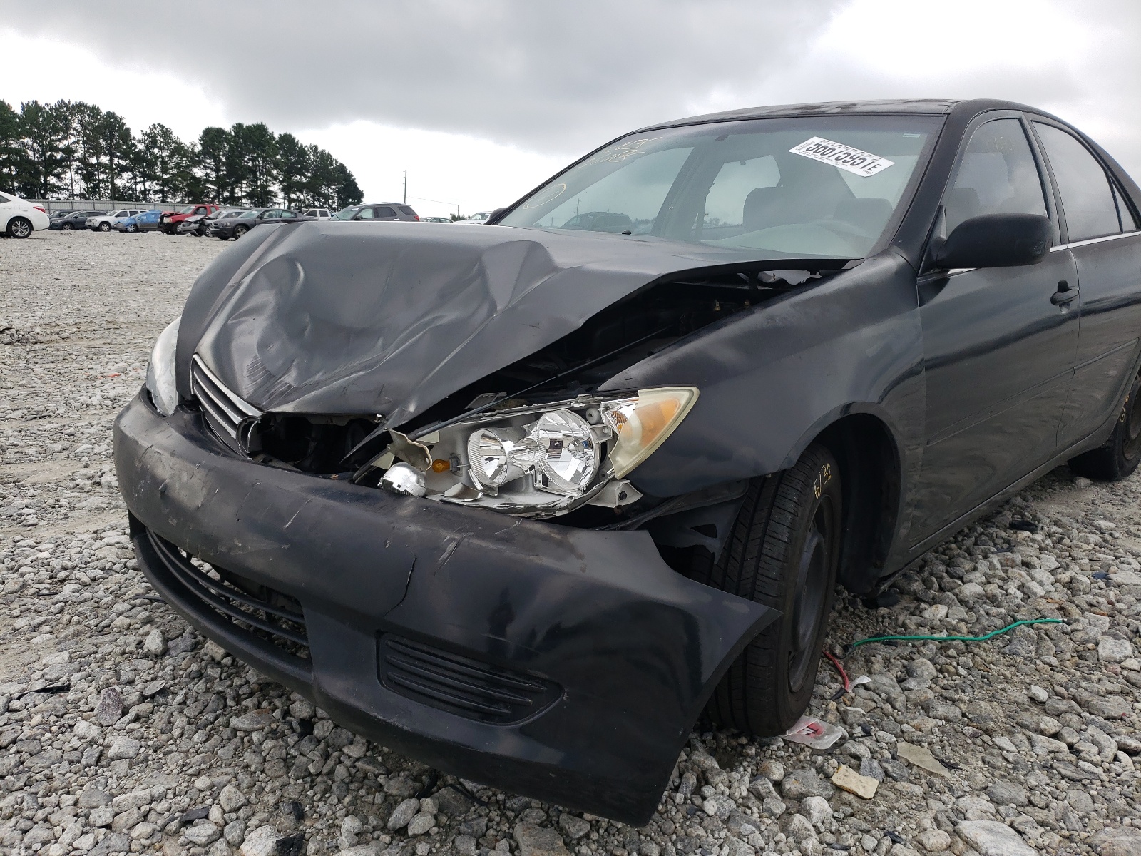 Photo 9 from auction – 2005 TOYOTA CAMRY LE with VIN 4T1BE32K15U038259