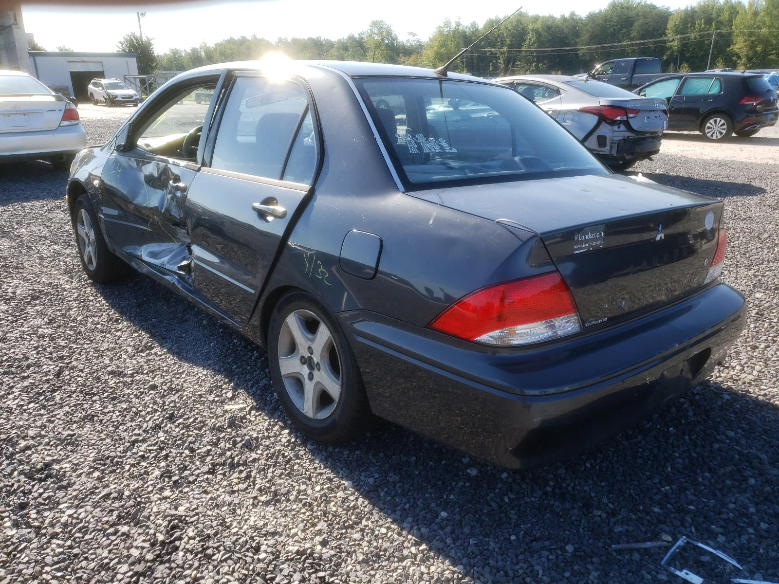 Photo 3 from auction – 2003 MITSUBISHI LANCER with VIN JA3AJ26E03U074028