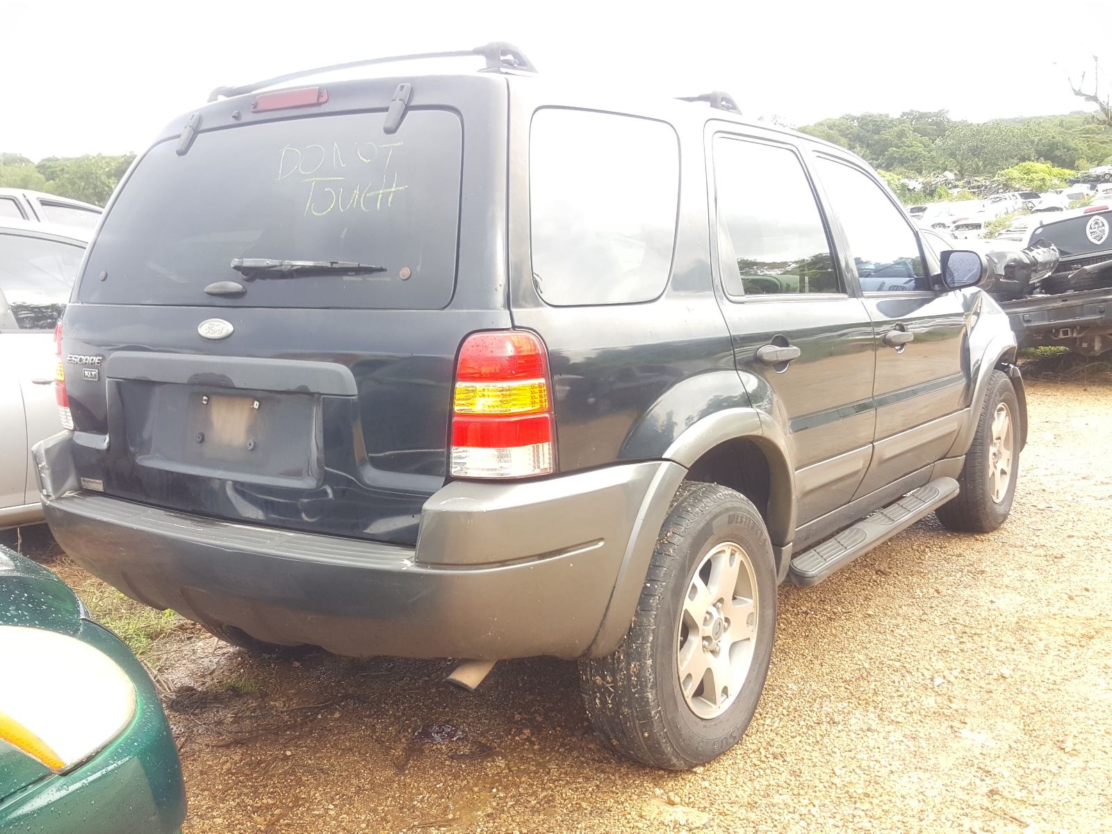 Photo 4 from auction – 2004 FORD ESCAPE XLT with VIN 1FMYU93174KB68126