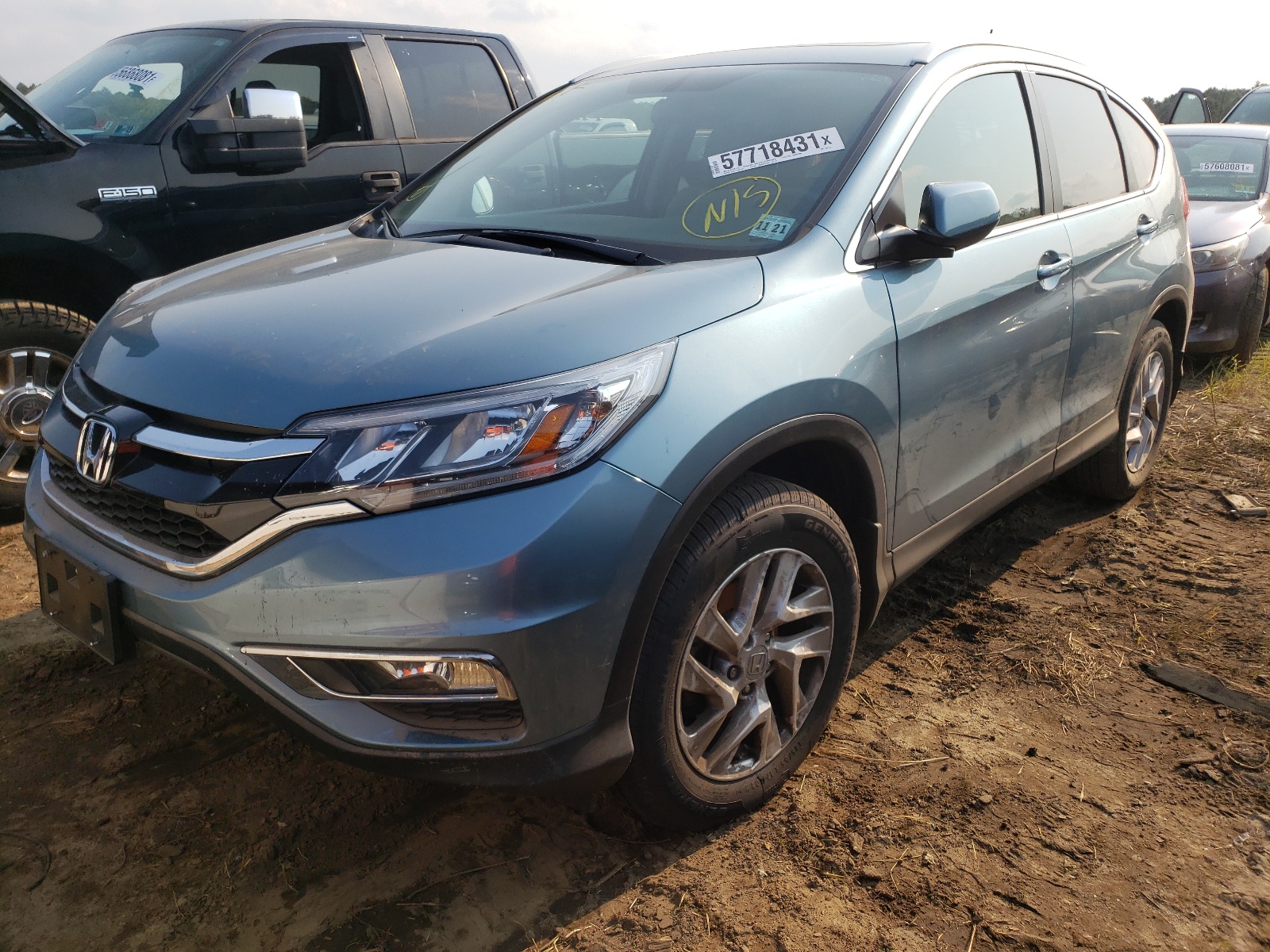 Photo 2 from auction – 2016 HONDA CR-V EXL with VIN 2HKRM4H79GH706773