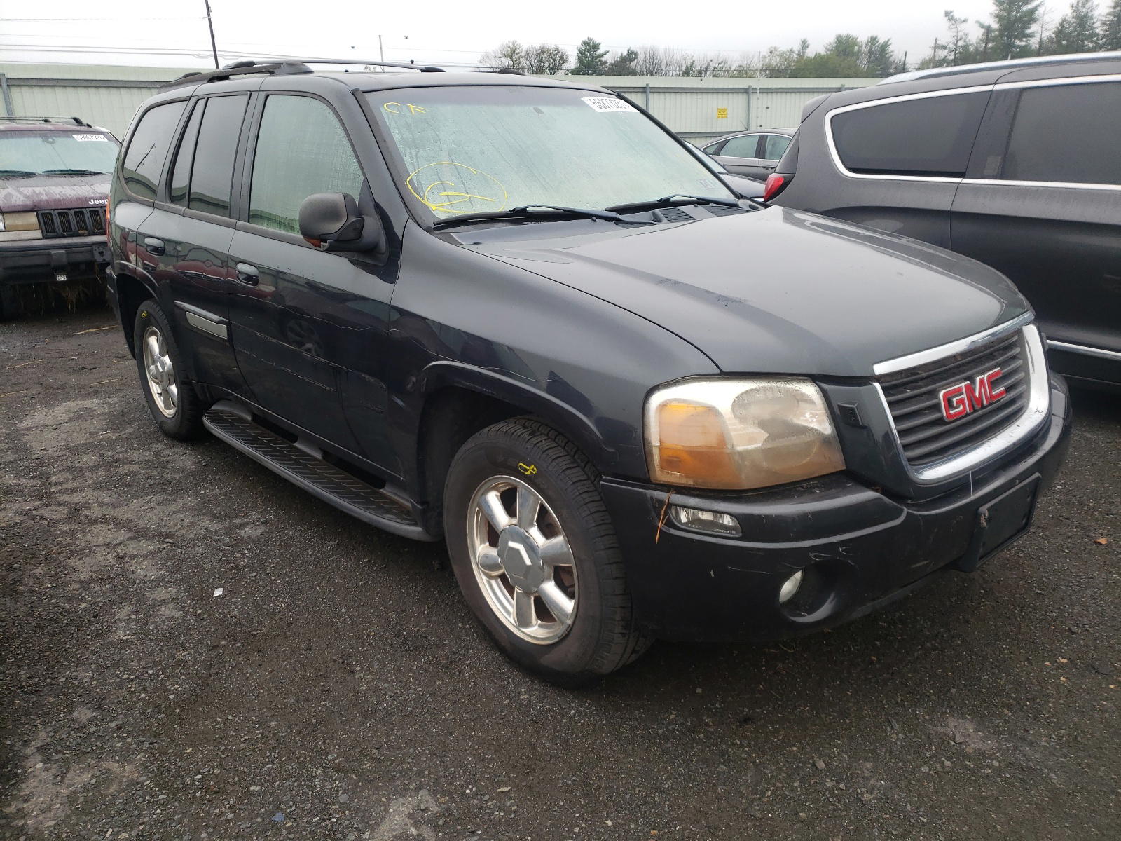 GMC ENVOY 2003 with VIN 1GKDT13S532246633 - Photo from auction