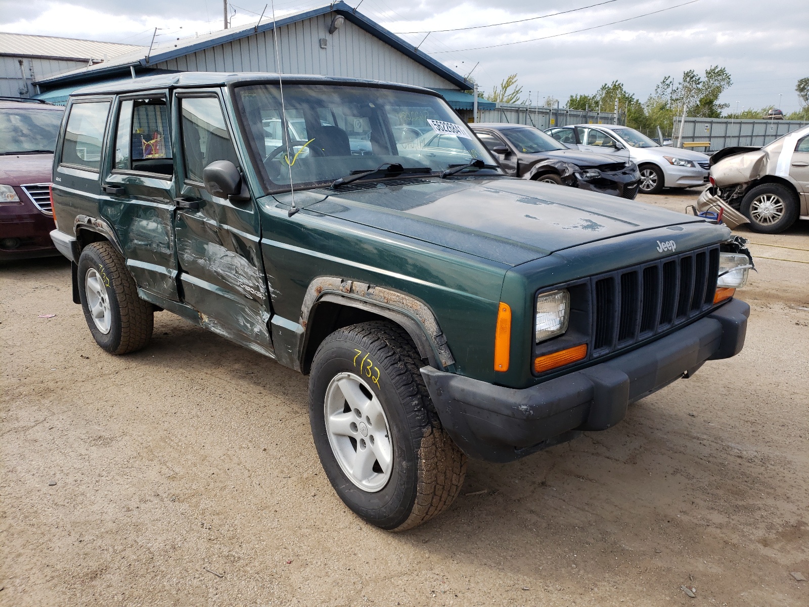 JEEP CHEROKEE S 1999 with VIN 1J4FN28S8XL609501 - Photo from auction