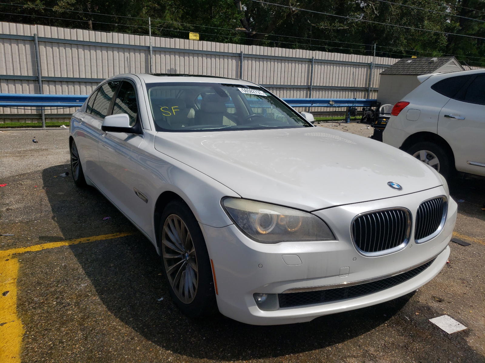 BMW 740 LI 2011 with VIN WBAKB4C50BC574002 - Photo from auction