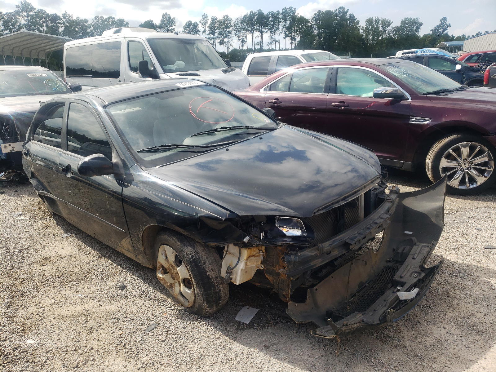 KIA SPECTRA EX 2009 with VIN KNAFE221595653224 - Photo from auction