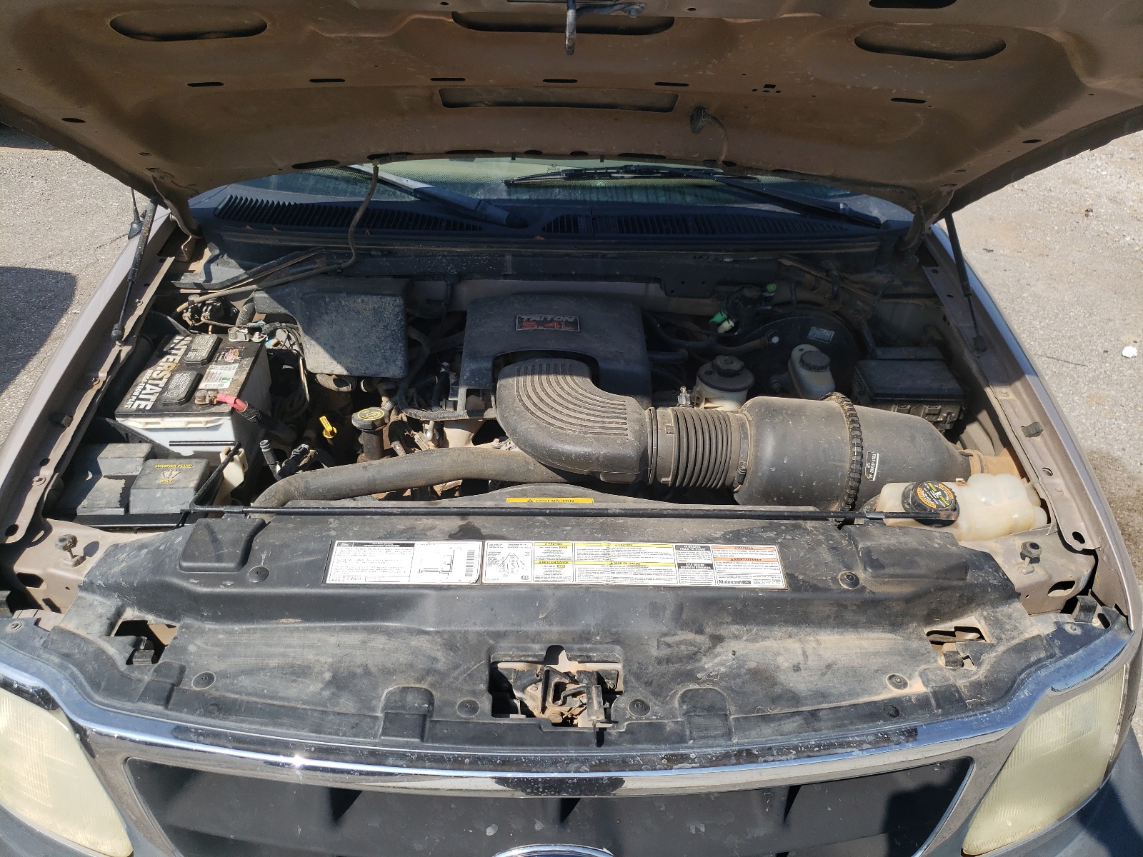 Photo 7 from auction – 1998 FORD F150 with VIN 1FTRF18L2WKA42807