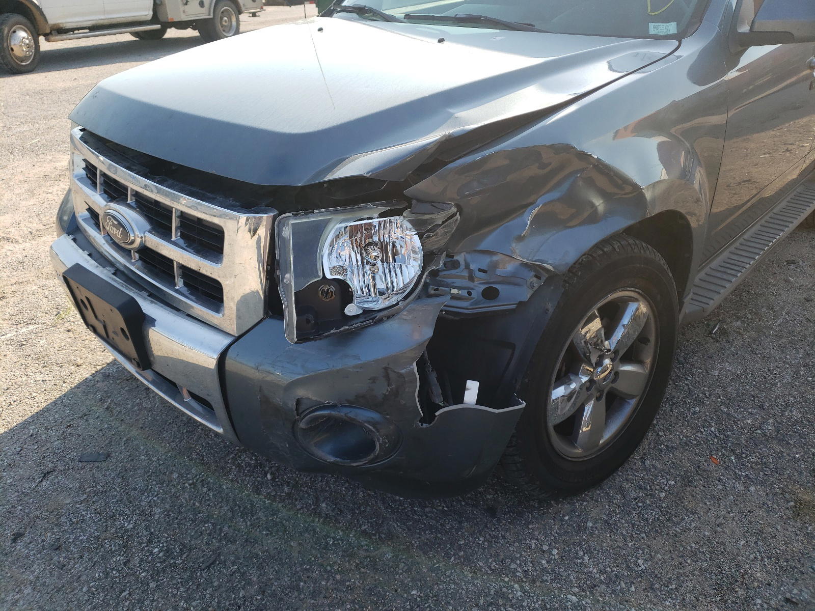 Photo 9 from auction – 2010 FORD ESCAPE LIM with VIN 1FMCU9EG2AKA00238