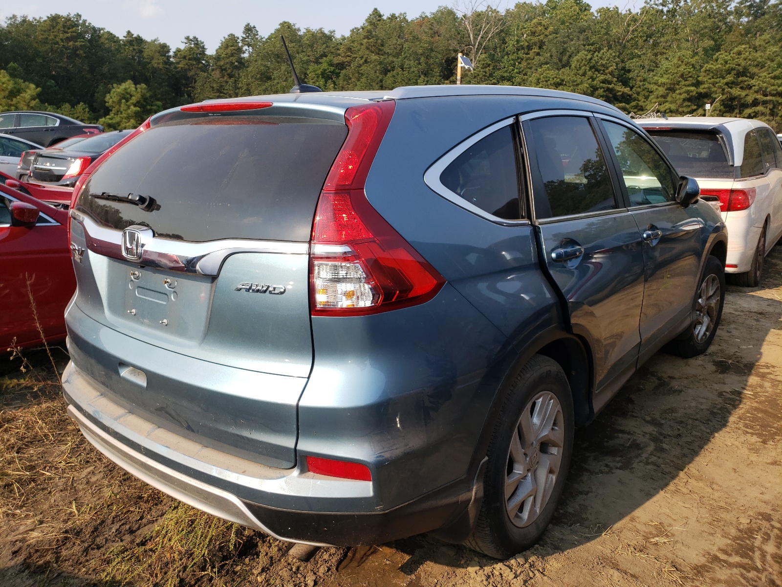 Photo 4 from auction – 2016 HONDA CR-V EXL with VIN 2HKRM4H79GH706773