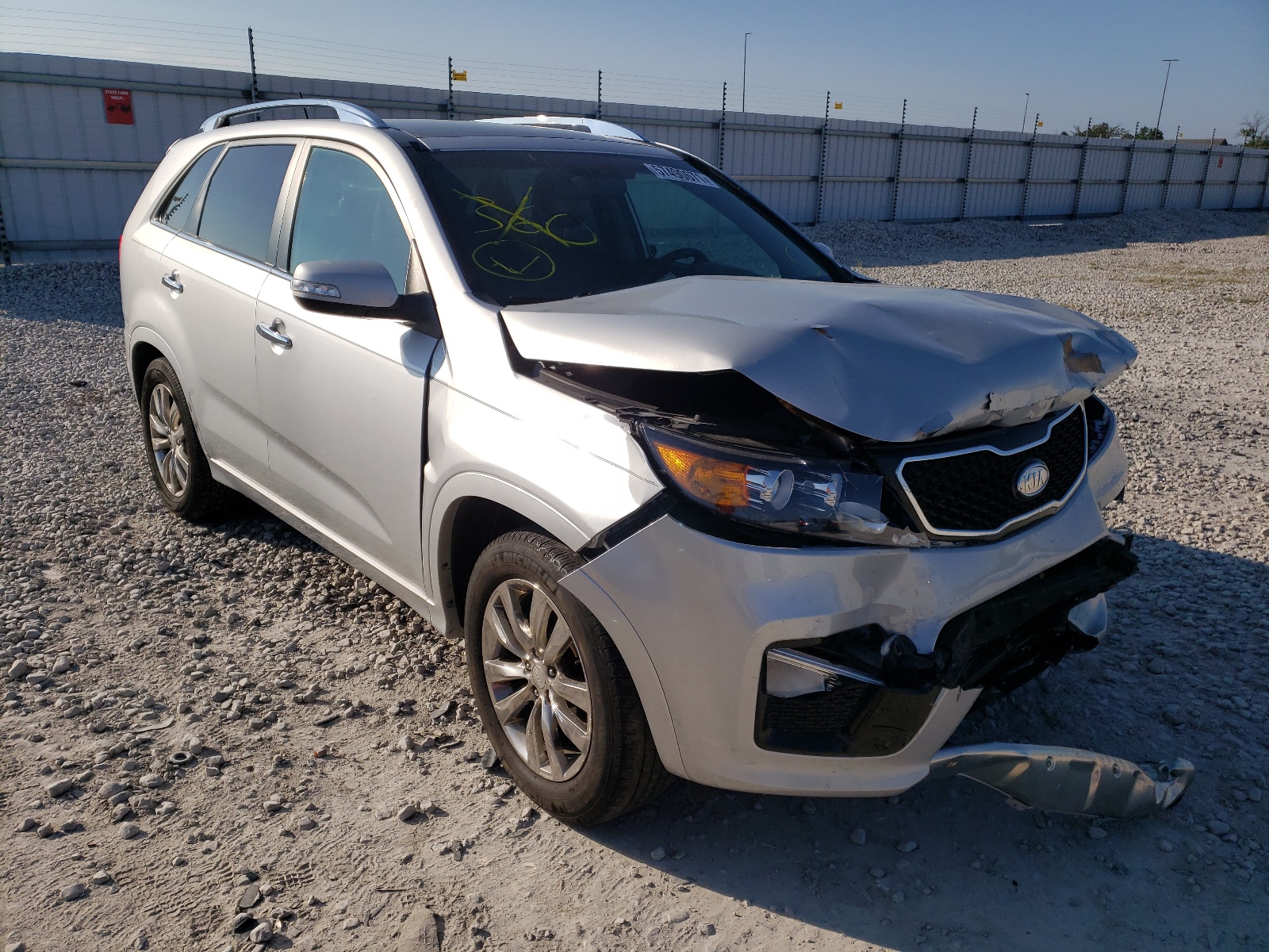 KIA SORENTO SX 2011 with VIN 5XYKWDA23BG172549 - Photo from auction