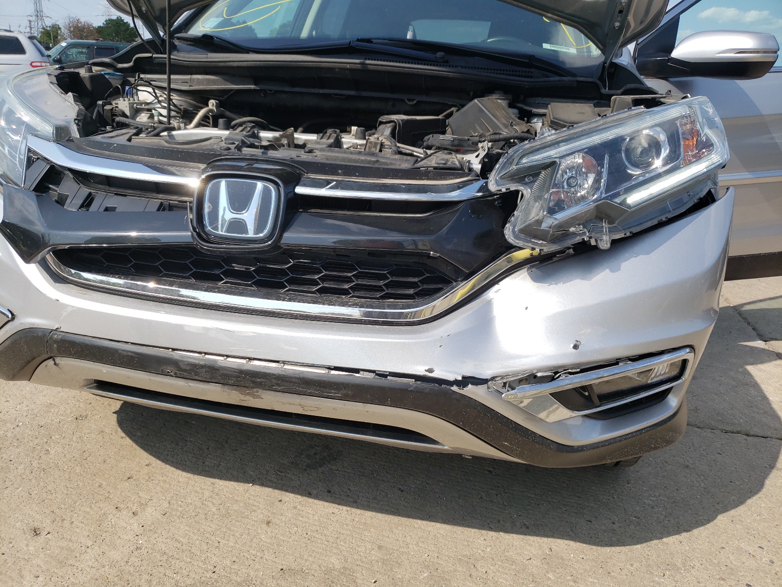 Photo 9 from auction – 2016 HONDA CR-V TOURI with VIN 5J6RM4H98GL075991