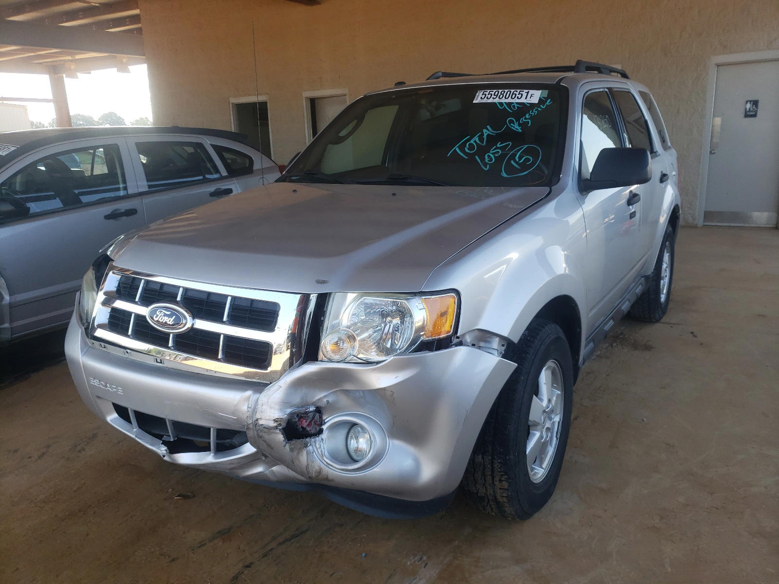 Photo 2 from auction – 2010 FORD ESCAPE XLT with VIN 1FMCU0D78AKD37204