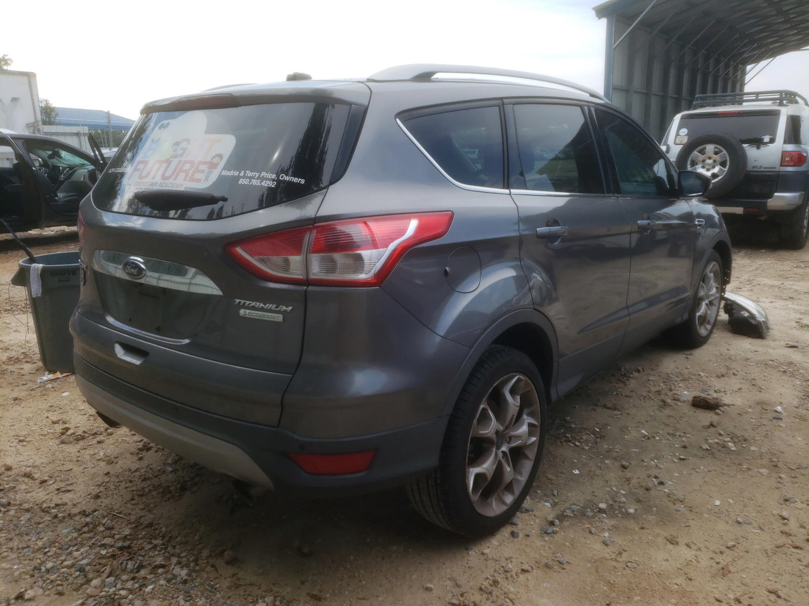 Photo 4 from auction – 2014 FORD ESCAPE TIT with VIN 1FMCU0J97EUA35290