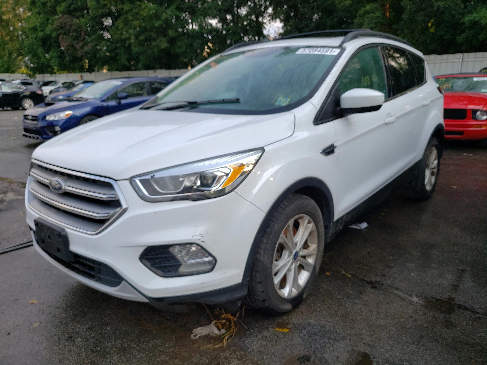 Photo 2 from auction – 2017 FORD ESCAPE SE with VIN 1FMCU9GD1HUD99404