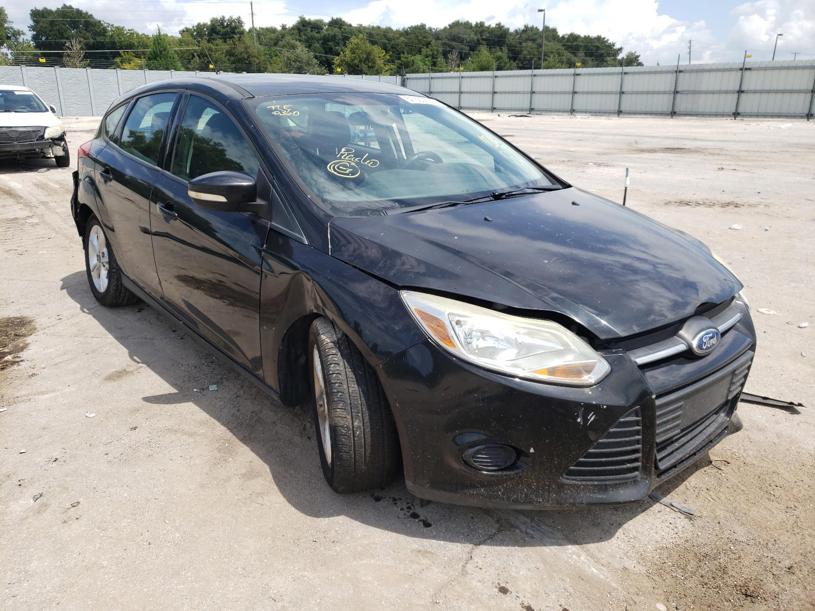 FORD FOCUS SE 2013 with VIN 1FADP3K26DL336128 - Photo from auction