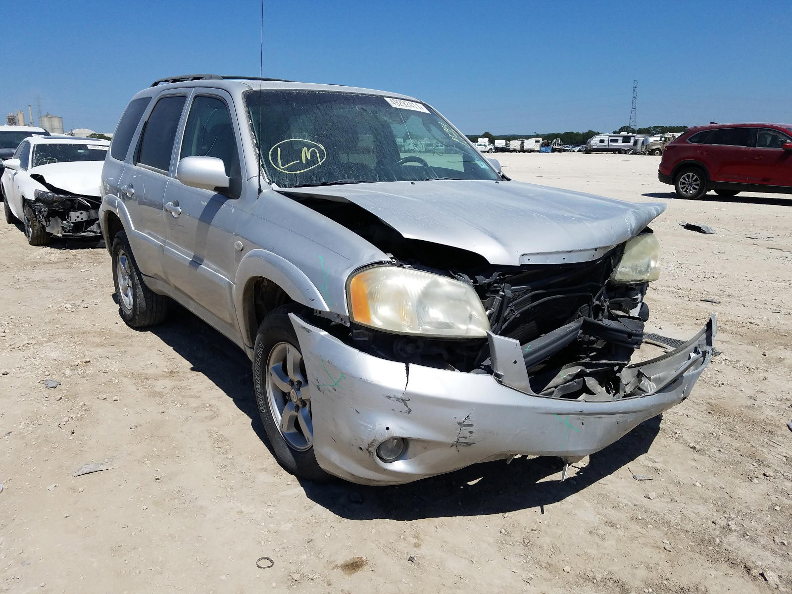 MAZDA TRIBUTE S 2005 with VIN 4F2YZ06155KM32412 - Photo from auction