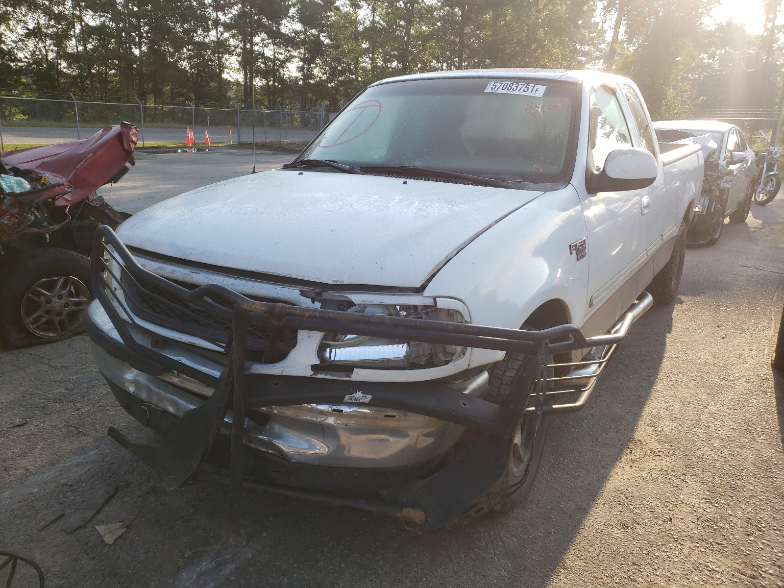 Photo 2 from auction – 1998 FORD F150 with VIN 1FTRX17L0WNA68786