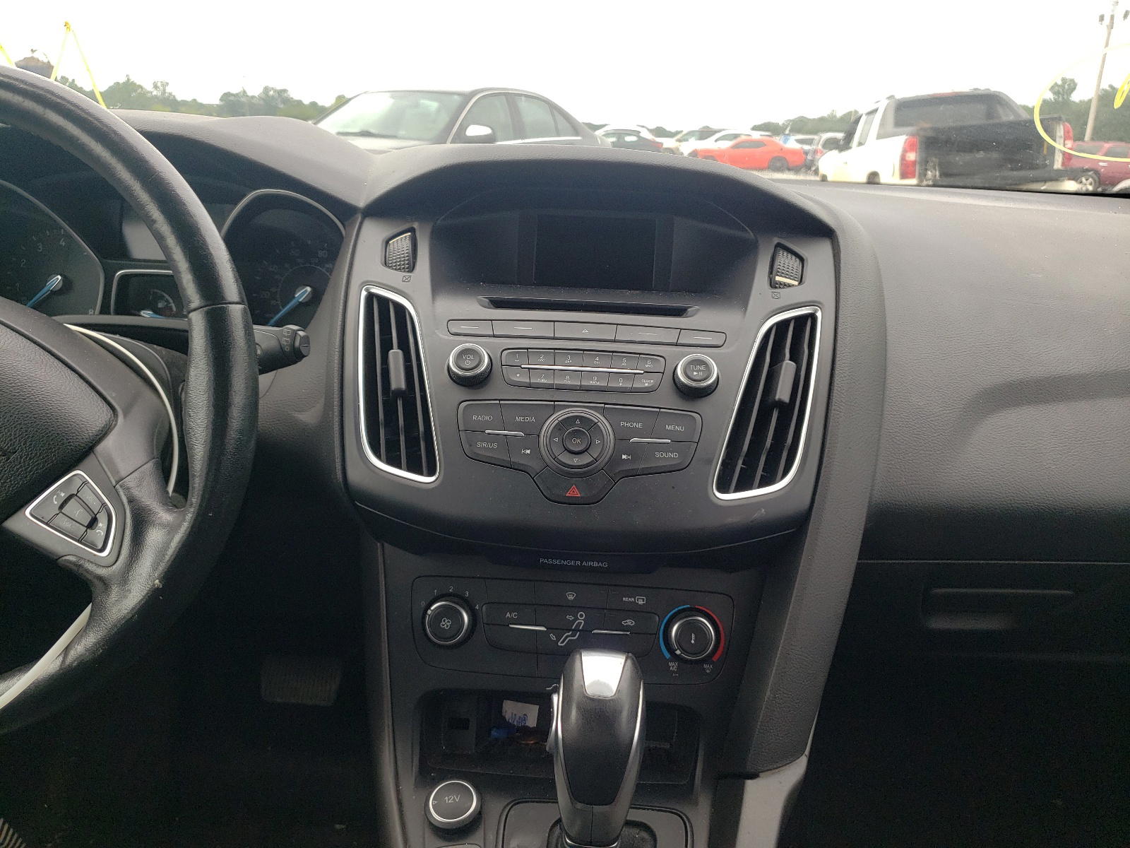 Photo 9 from auction – 2016 FORD FOCUS SE with VIN 1FADP3K27GL259709