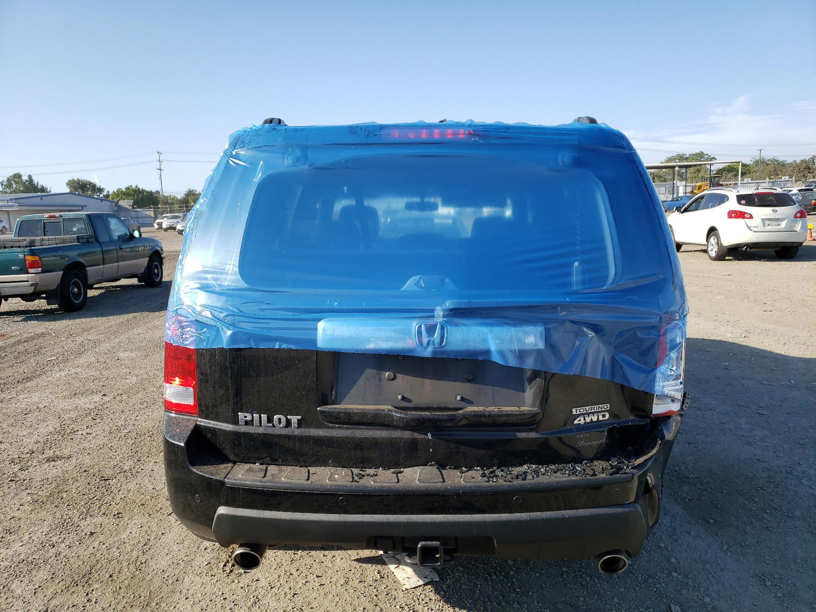 Photo 9 from auction – 2011 HONDA PILOT TOUR with VIN 5FNYF4H95BB083165