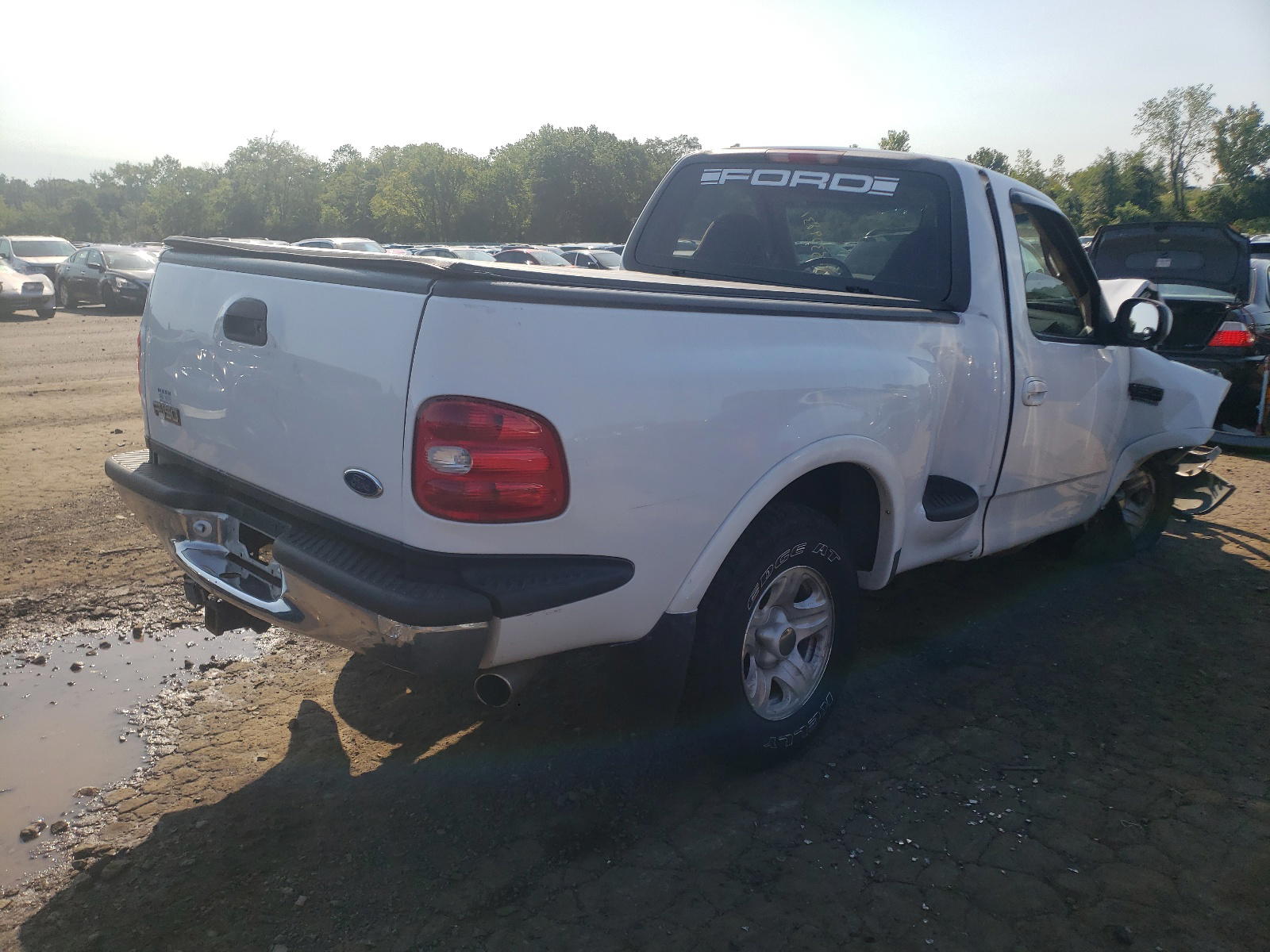 Photo 4 from auction – 1999 FORD F150 with VIN 2FTRF08W1XCA29508