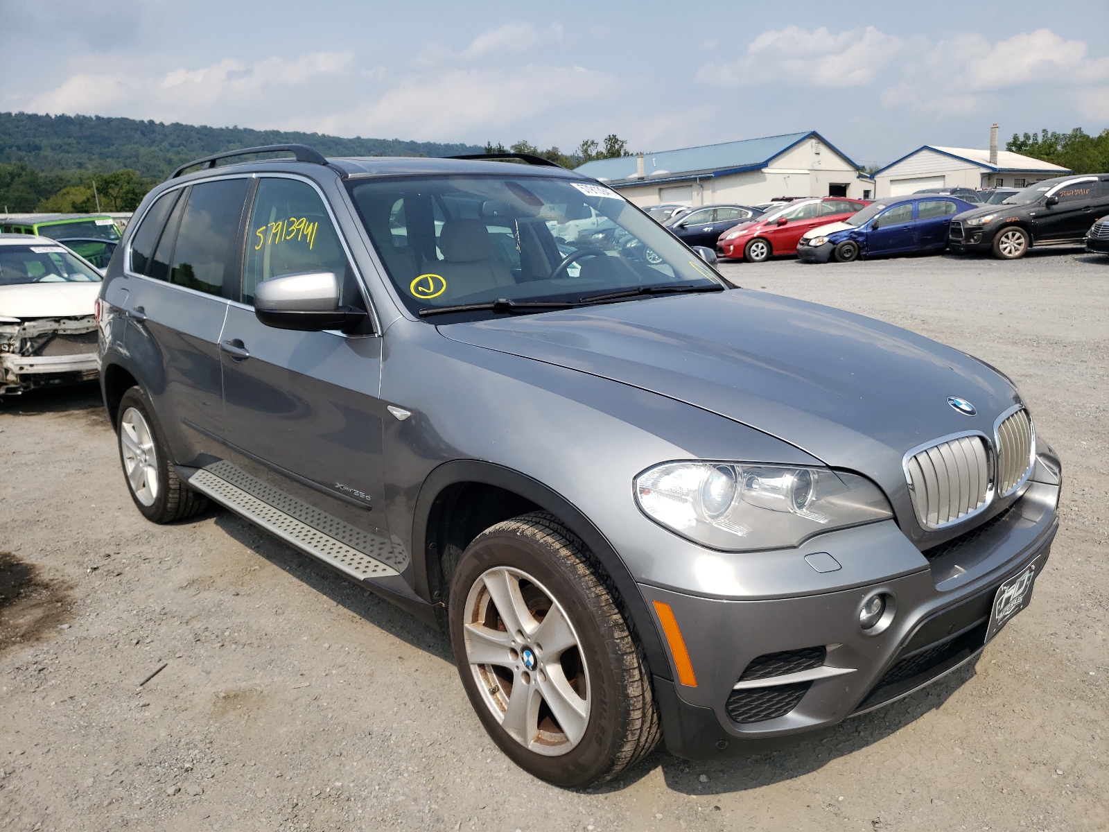 BMW X5 XDRIVE3 2013 with VIN 5UXZW0C5XD0B93391 - Photo from auction