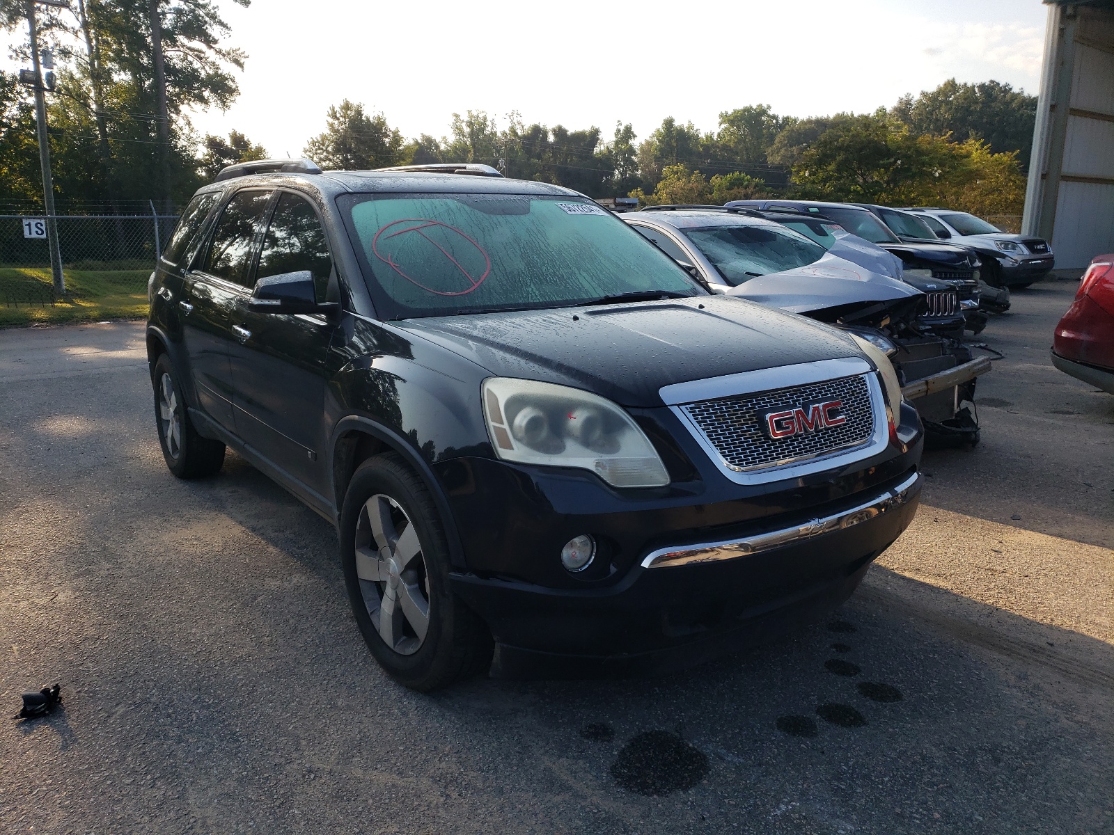 GMC ACADIA SLT 2009 with VIN 1GKER23DX9J155785 - Photo from auction