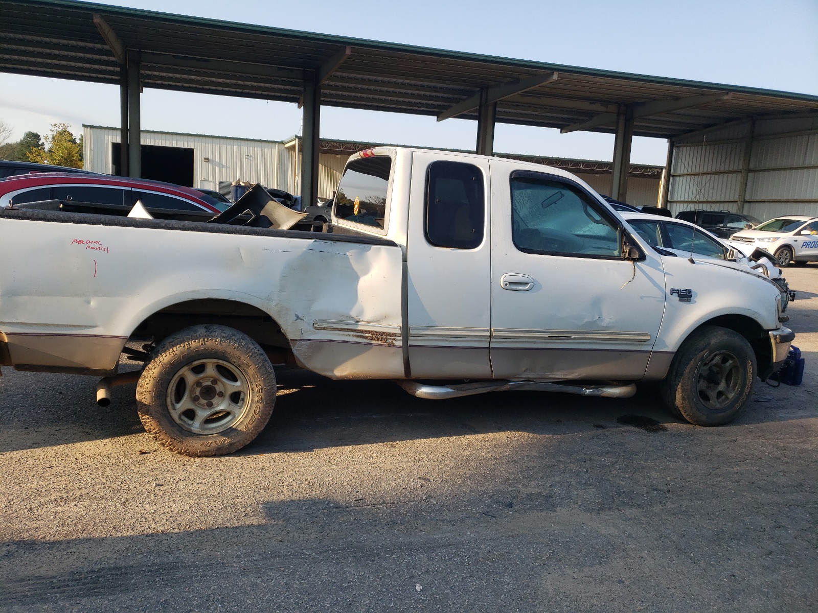 Photo 9 from auction – 1998 FORD F150 with VIN 1FTRX17L0WNA68786