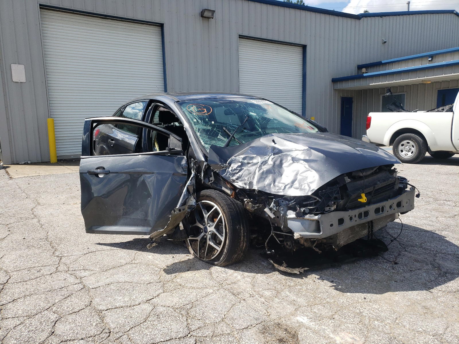 FORD FOCUS SEL 2017 with VIN 1FADP3H2XHL340146 - Photo from auction
