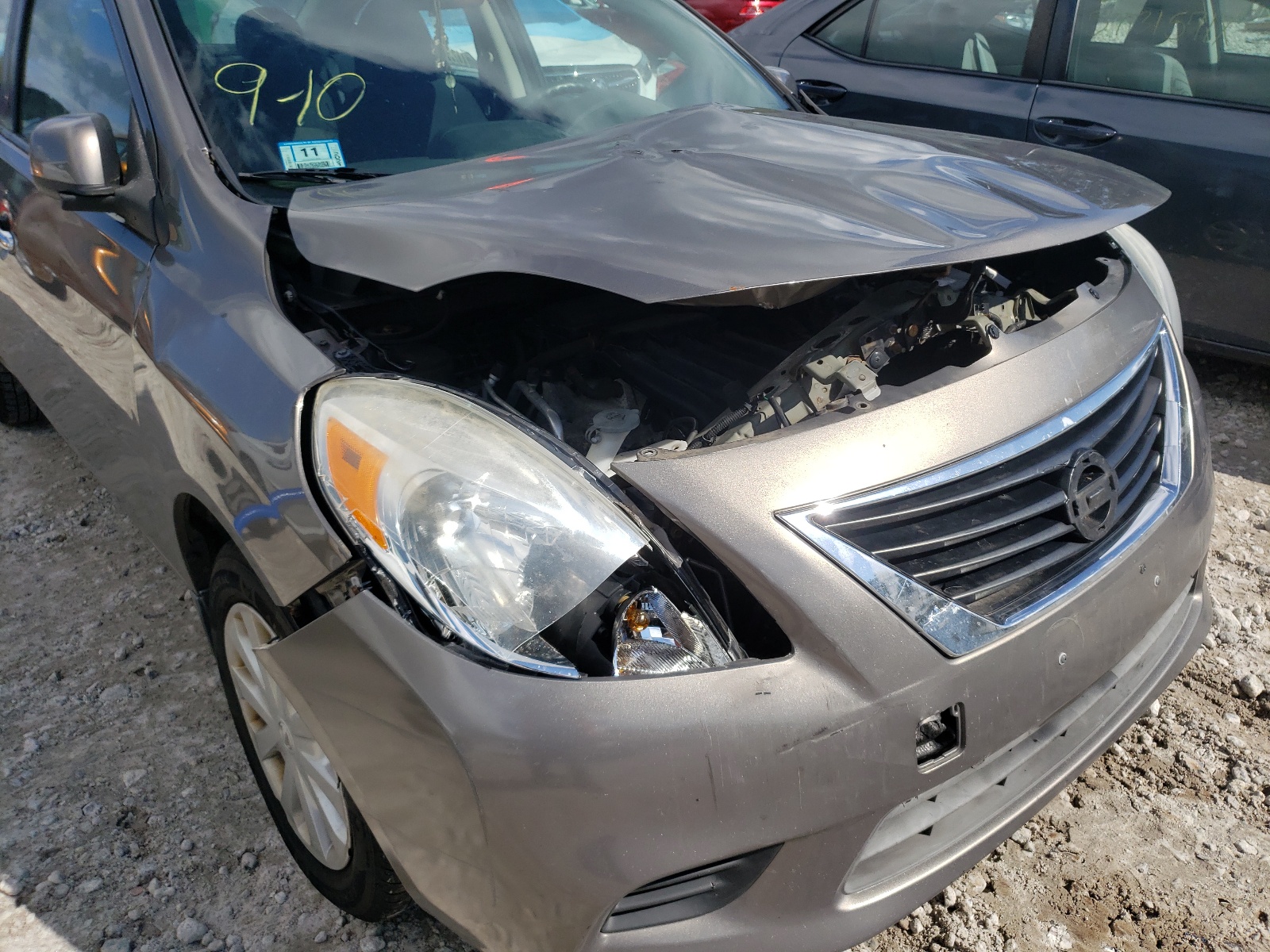 Photo 9 from auction – 2012 NISSAN VERSA S with VIN 3N1CN7AP0CL888861